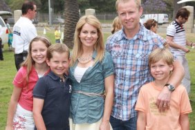 Candace Cameron Bure blue shirt white skirt belt white tank top